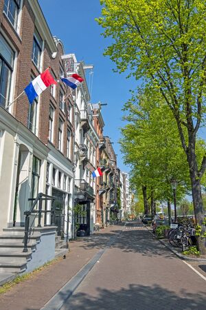 Medieval facades at the Prinsengracht in Amsterdam Netherlands at Kingsdayの写真素材