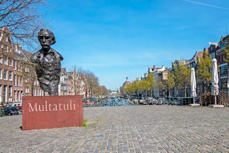 Amsterdam, Netherlands - April 7, 2020: Statue of Multatuli, a famous dutch writer, on a square in Amsterdam the Netherlandsのeditorial素材