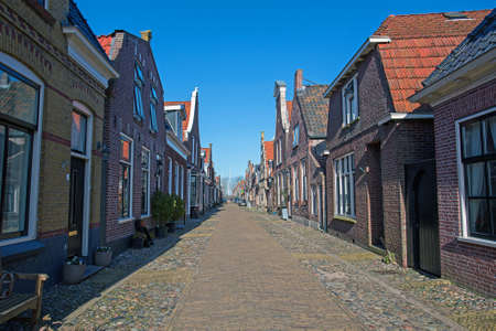 Medieval houses in the streets of Hindeloopen in the Netherlandsの写真素材