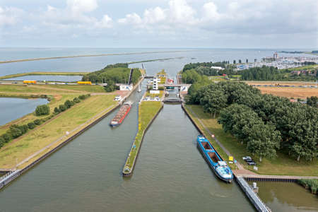 Aerial from freighters at the Houtrib sluices near Lelystand in the Netherlandsの写真素材
