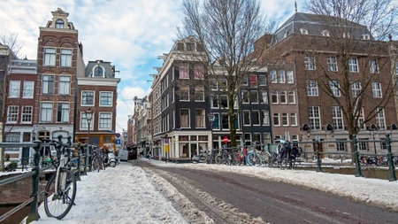 City scenic from snowy Amsterdam in winter in the Netherlandsの写真素材