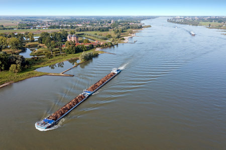 Aerial from shipping on the river Merwede near castle Loevestein in the Netherlandsの写真素材