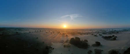 Aerial panorama from the forest Drents Friese Woud in the Netherlands at sunriseの写真素材