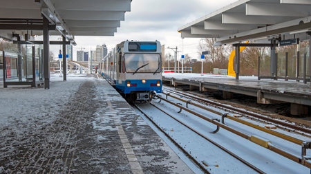 Metro departing from Van der Madeweg station in Amsterdam netherlands in winter