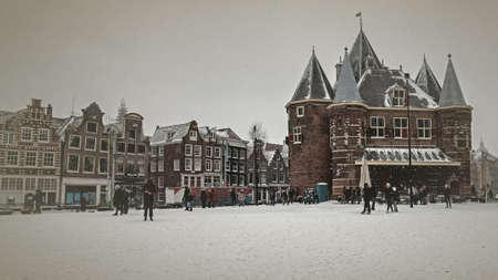 Old vintage photo from the Nieuwmarkt in Amsterdam the Netherlands in winterの写真素材