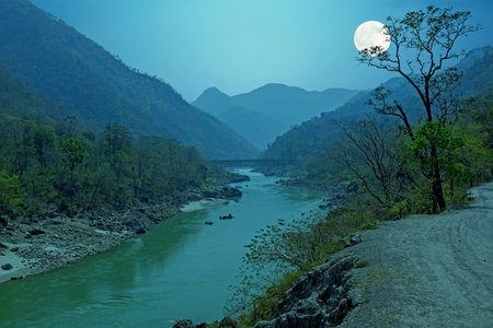 Ganga river in the Himalayas in India Asia with full moon