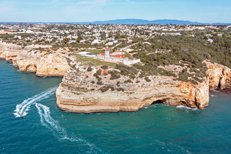 Aerial from lighthouse farol de Alfanzina on a cliff in the Algarve Portugalの写真素材