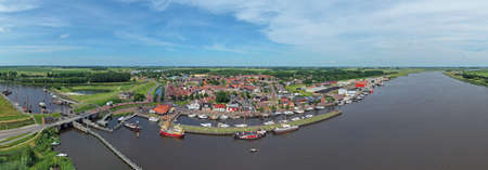 Aerial panorama from the traditional town of Zoutkamp in the Netherlandsの写真素材