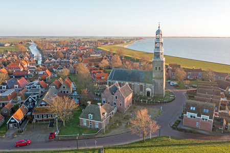 Aerial from the historical city Hindeloopen at the IJsselmeer in the Netherlandsの写真素材