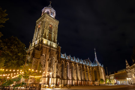 View on the Lubinius church in the medieval city Deventer in the Netherlands by nightの写真素材