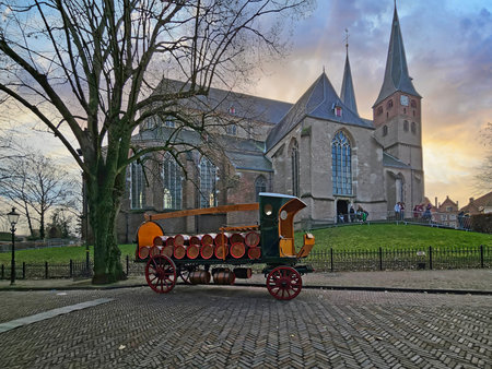 Deventer, Netherlands, December 16, 2023:Old beer carriage at the church in the streets of Deventer...