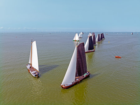 Aerial from competition skutsjesilen near Hindeloopen on the IJsselmeer in the Netherlandsの写真素材