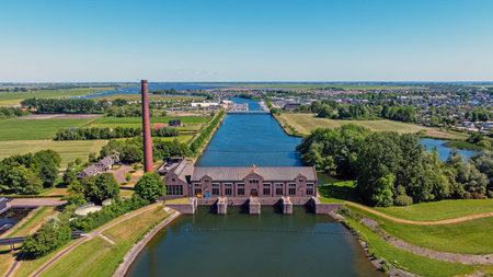 Aerial from the medieval Wouda pump station at the IJsselmeer in the Netherlandsの写真素材