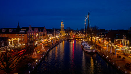 Aerial from christmas in the city Lemmer in Friesland the Netherlands at sunsetの写真素材