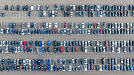Top view of parked cars in a large parking area in Europe