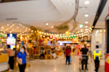 Abstract blur and defocus supermarket and shopping mall of department store interior for background for wallpaper decorative design.の写真素材