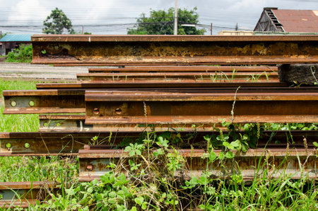 Old train tracks for transport have rust waiting for maintenance for wallpaper decorative design.の写真素材