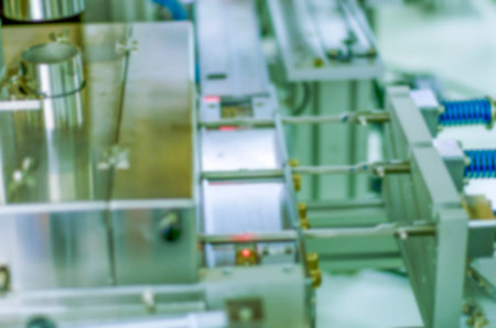 Blur background Industrial machine in the factory semiconductor industry for wallpaper decorative...