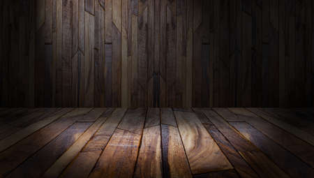 Product display, Wooden dark desk floor and wall backgrounds, gray and dark room, interior texture.の写真素材