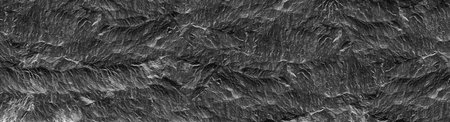 Gray grunge banner. Abstract stone background. The texture of the stone wall. Close-up. Light gray...