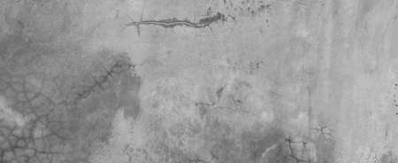 Panorama horizontal dark old cement wall for the background, concrete wall texture, natural gray concrete pattern, background with copy space.の写真素材