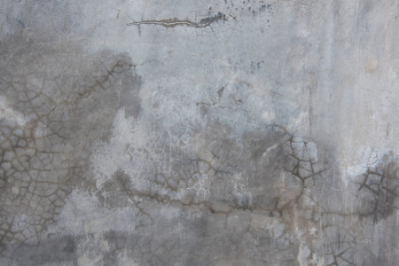 Horizontal dark old cement wall for the background, Texture of a grungy black concrete wall as background for wallpaper decorative design.の写真素材