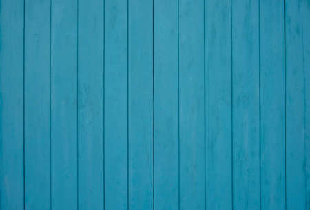 Old weathered wooden plank painted in turquoise blue color. Vintage beach wood background and wallpaper decorative design.の写真素材