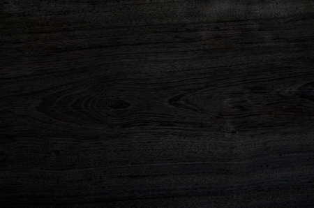 Black wooden texture dark background blank for wallpaper decorative design.の写真素材