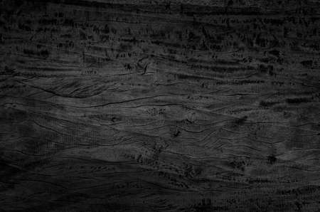Black wood board texture background. Close-up wooden panel with beautiful patterns.の写真素材