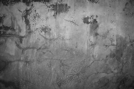 Horizontal dark old cement wall for the background, Texture of a grungy black concrete wall as background for wallpaper decorative design.の写真素材