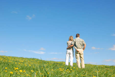 Couple in love on spring meadowの写真素材