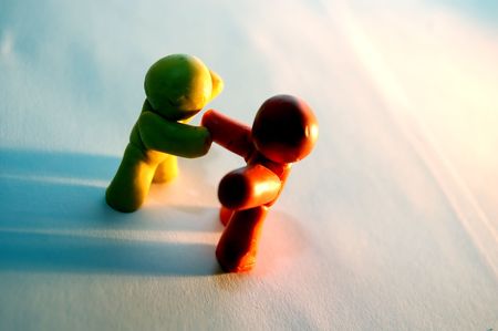 2 plasticine figures agreement and handshakeの写真素材