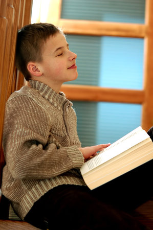 Back to school. Portrait of young boy studying