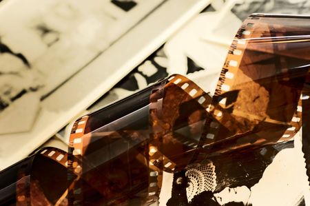 Grunge film strip over old unique photosの写真素材