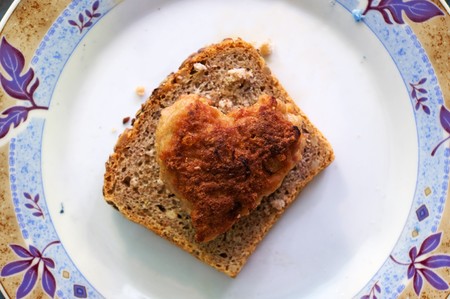 A hamburger steak in a heart shape. Coceptual imageの写真素材
