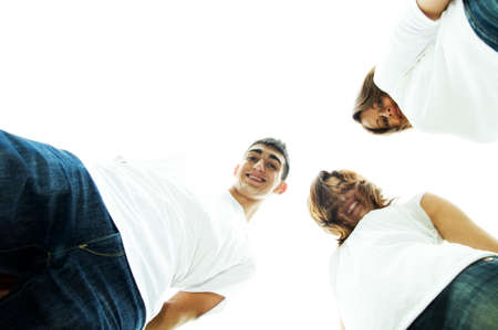 Team of friends standing together and smilingの写真素材