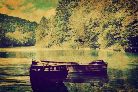 Lake and two boats in forest. Retro vintage romantic syleの写真素材