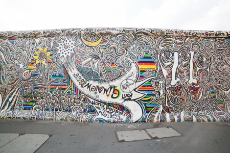 BERLIN, July 26  Graffiti at the East Side Gallery on July 26, 2013 in Berlin, Germany  Possibly the largest and longest open air gallery in the world  East Side Gallery documents a time of change and express the euphoria and great hopes for a better futuのeditorial素材