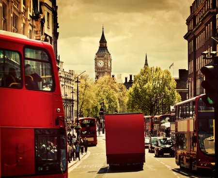 Busy street of London, England, the UK. Red buses, Big Ben in the background. のeditorial素材