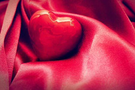 Red heart in satin cloth  Symbol of love, Valentineの写真素材