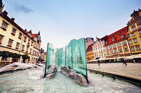 Wroclaw, Poland. The market square with the famous fountain and colorful historical buildings....