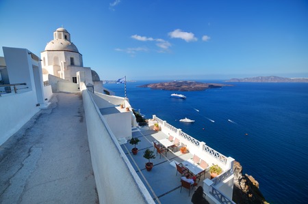 A white church in Fira on Santorini island, Greece. Traditional architecture over the Caldera, Aegean seaの写真素材