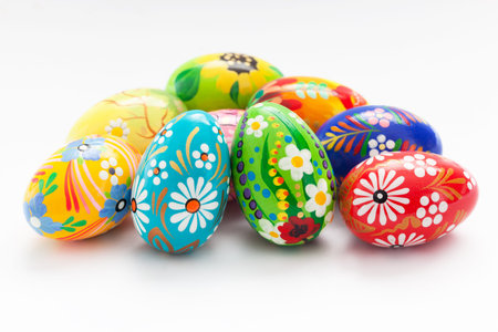 Hand painted Easter eggs isolated on white. Floral, colorful spring patterns and designs....