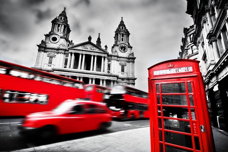 St Paul's Cathedral facade, red bus, taxi cab and red telephone booth. Symbols of London, the UK. Black and whiteのeditorial素材