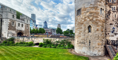 The Tower of London and the Gherkin skyscraper, England, the UK. The historic Royal Palace and...