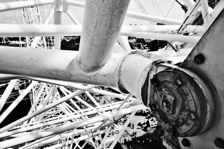 LONDON - JUNE 25: London Eye construction, mechanism as seen from the capsule on June 25 2015 in London, UK. The pipes make interesting architecture design. Black and whiteのeditorial素材