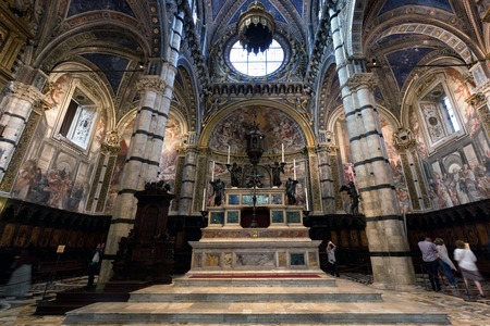 SIENA, ITALY - October 10, 2015: Interior of Siena Cathedral, Italian Duomo di Siena, Santa Maria Assunta. The 13th century church with its mosaic floor is a major tourism attraction in Siena, Italyのeditorial素材
