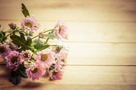 Bouquet of fresh spring flowers on rustic wood. Place for text on Valentine's Day, Mother's Day etc. Vintageの写真素材