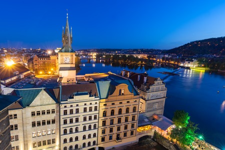 Old Town Water Tower - Staromestska Vodarna in Prague, Czech Republic. Vltava river at night as seen from the Charles Bridge tower.の写真素材