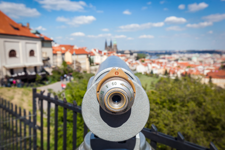 Tourist telescope in Prague, Czech Republic. Facing St. Vitus Cathedralの写真素材